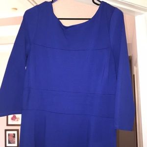 Size 14. Blue half sleeve, scoop back, dress.